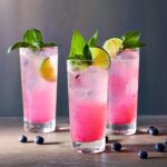 This is a photograph of 3 glasses of Citrus Berry smash, the made from the recipe in this post